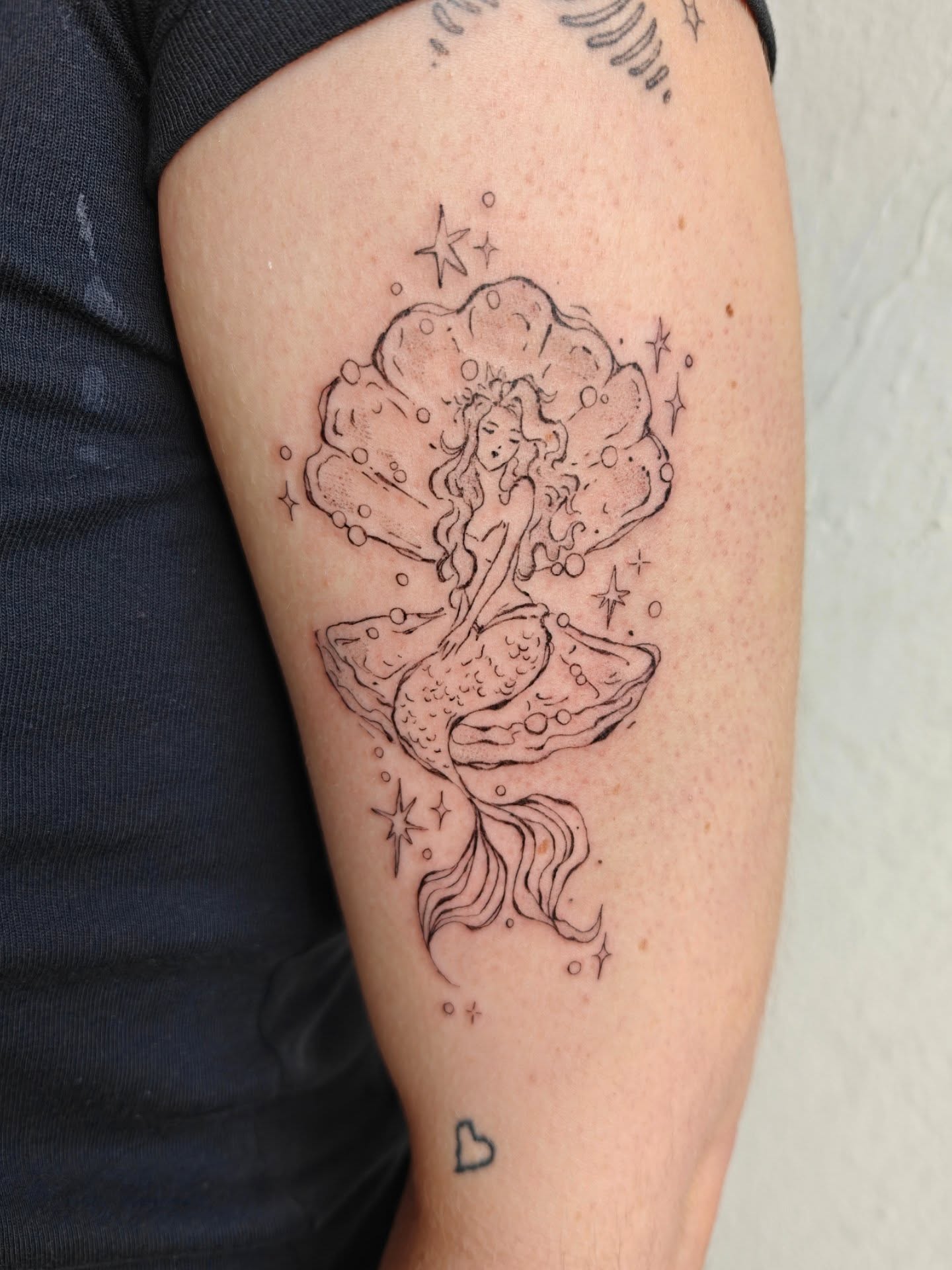 Mermaid In Seashell Tattoo