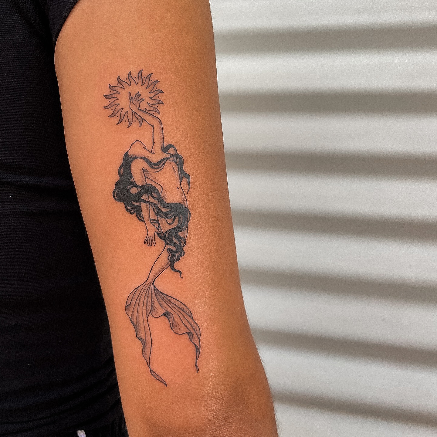Mermaid Reaching For The Sun Tattoo