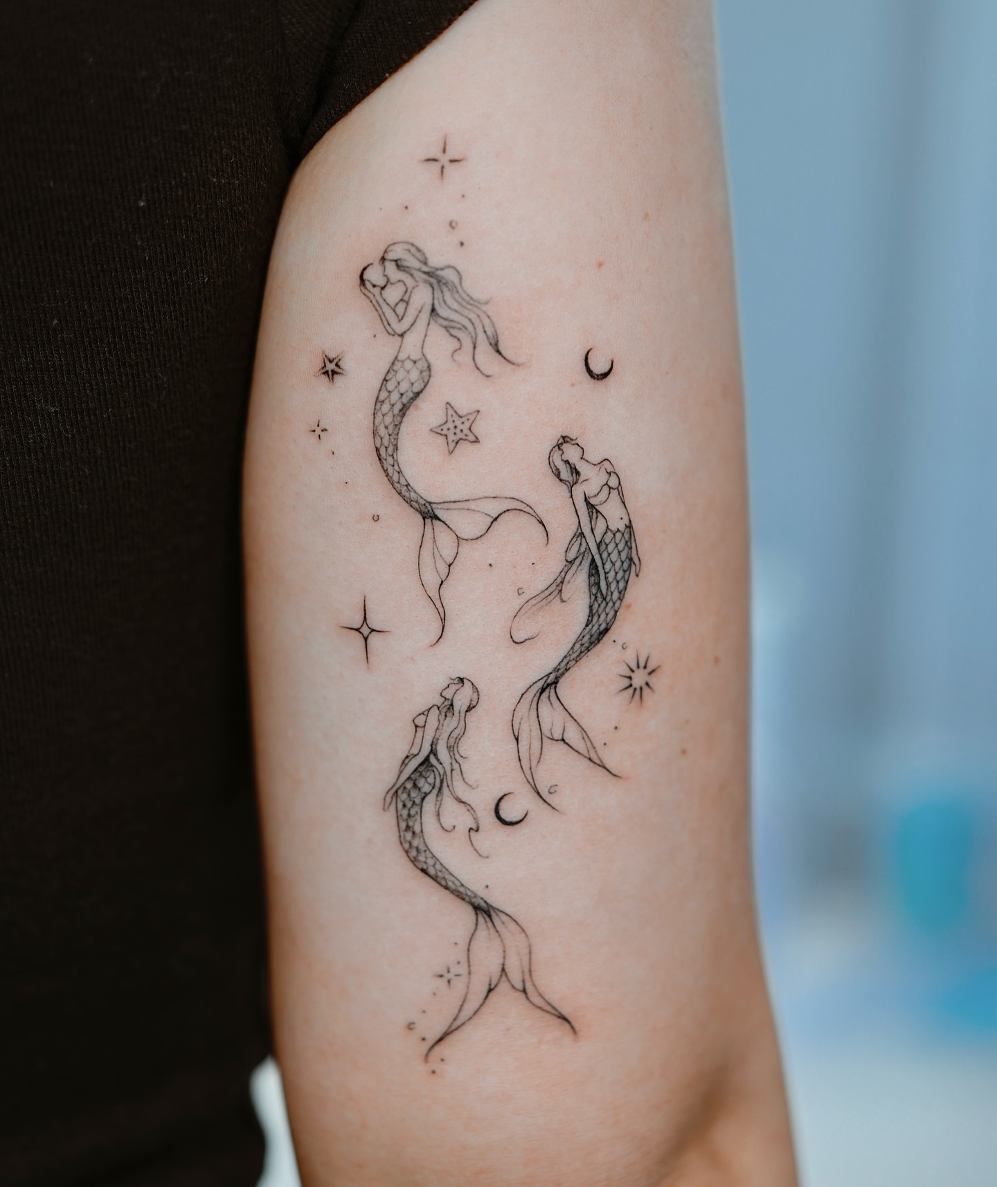Three Fine Line Mermaid Tattoo