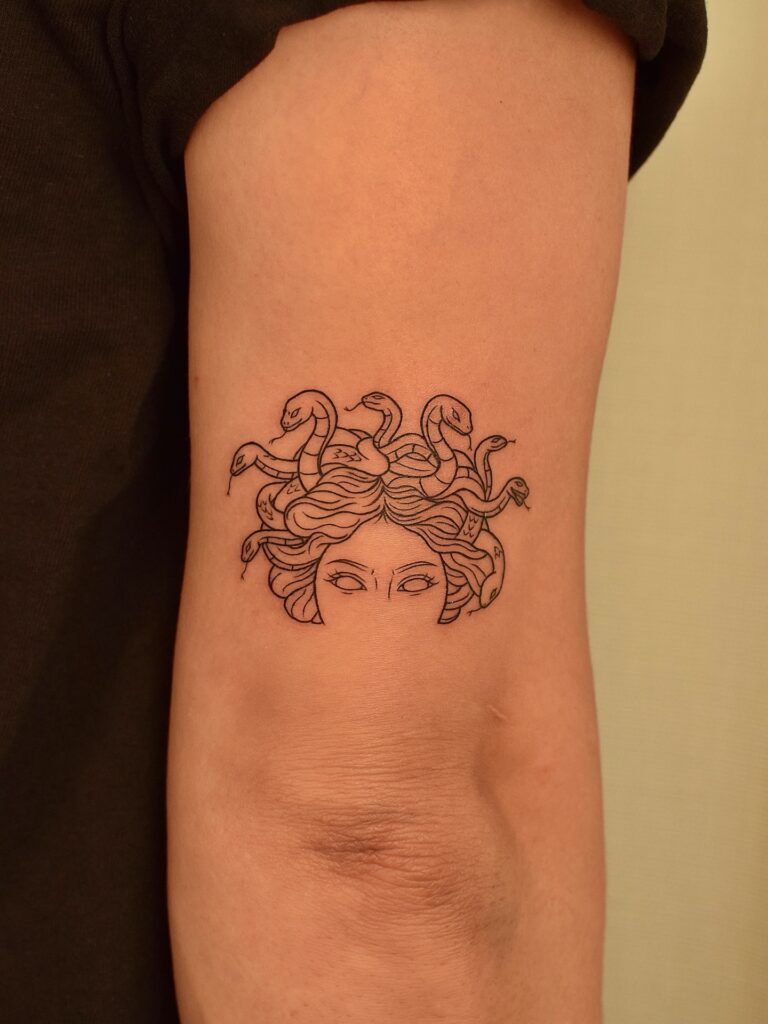 Micro Crescent Moon with Stippled Dust fine line tattoo