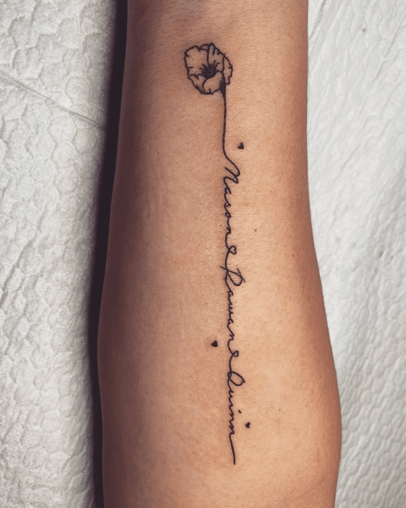 Micro Typography Along the Collarbone kids name tattoo