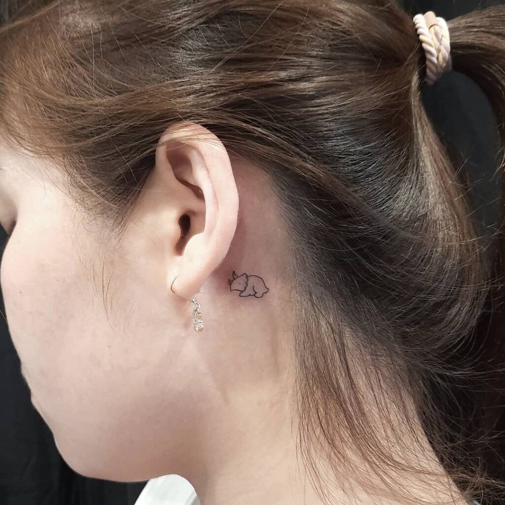 Playful Rubber Duck Behind Ear Tattoo