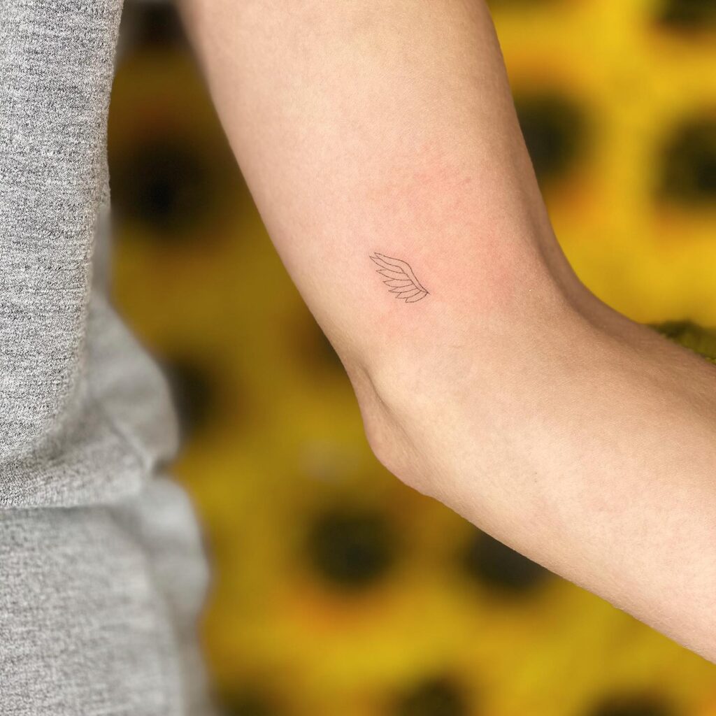Minimal Angel Wing Inner Arm Tattoo angel wings tattoo ideas tattoo