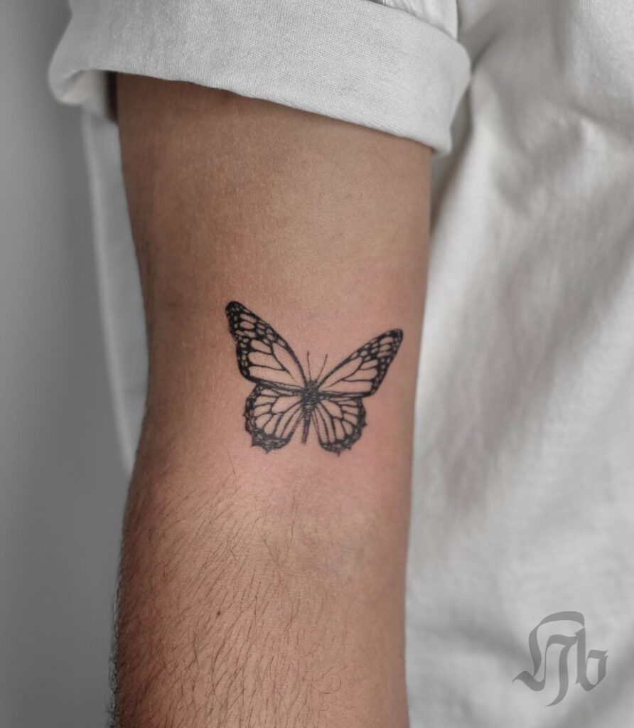 Minimal Black Butterfly Tattoo butterfly tattoo designs tattoo