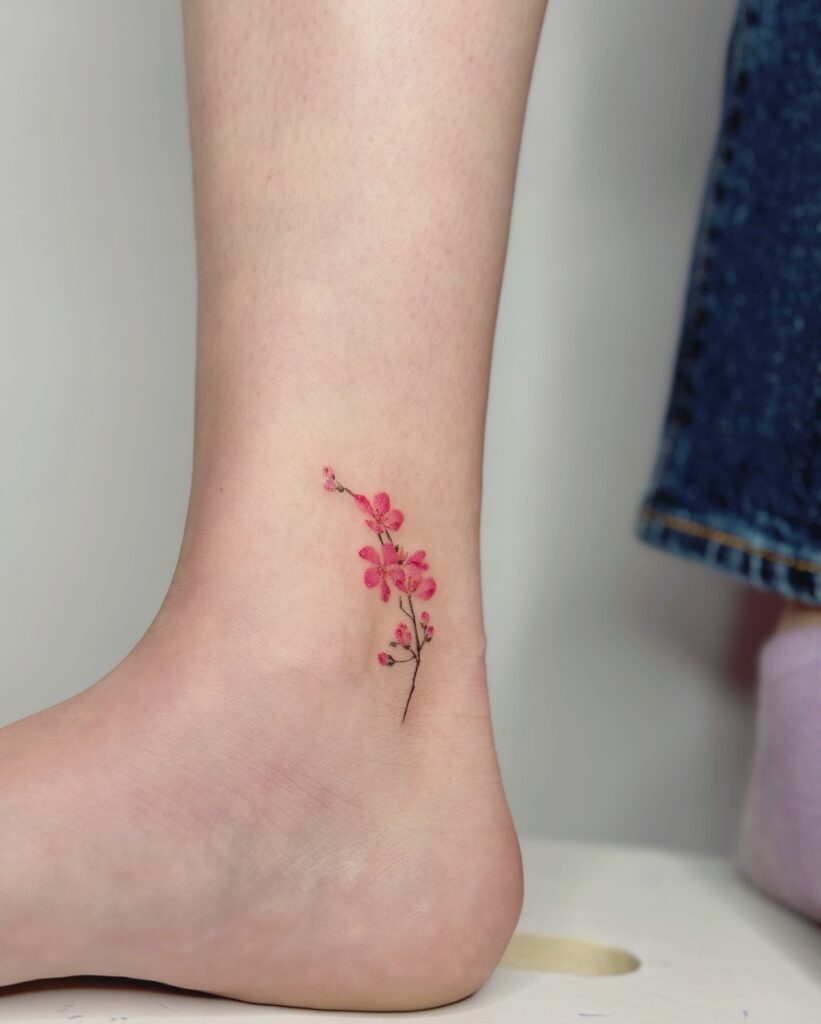 Minimal Cherry Blossom Ankle Tattoo cherry blossom tattoo ideas tattoo