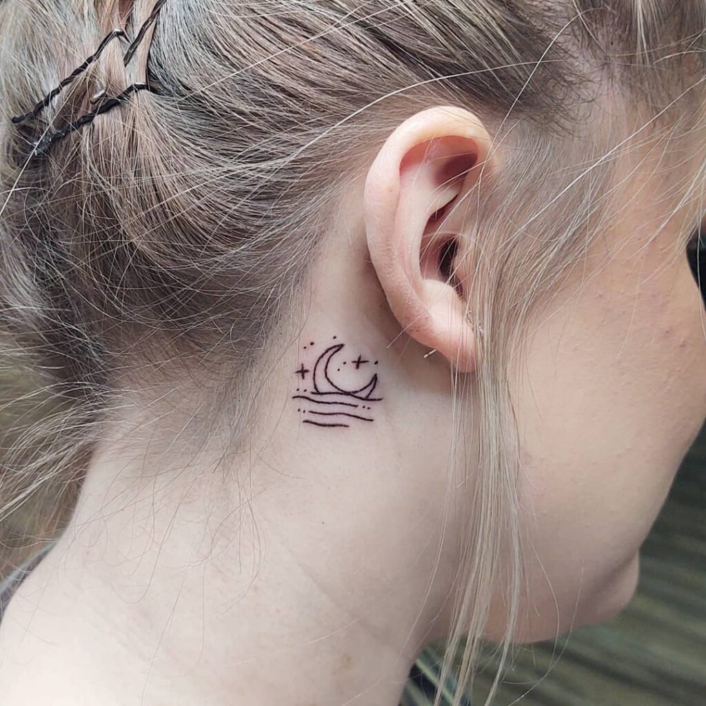 Small Black Rose Behind Ear Tattoo
