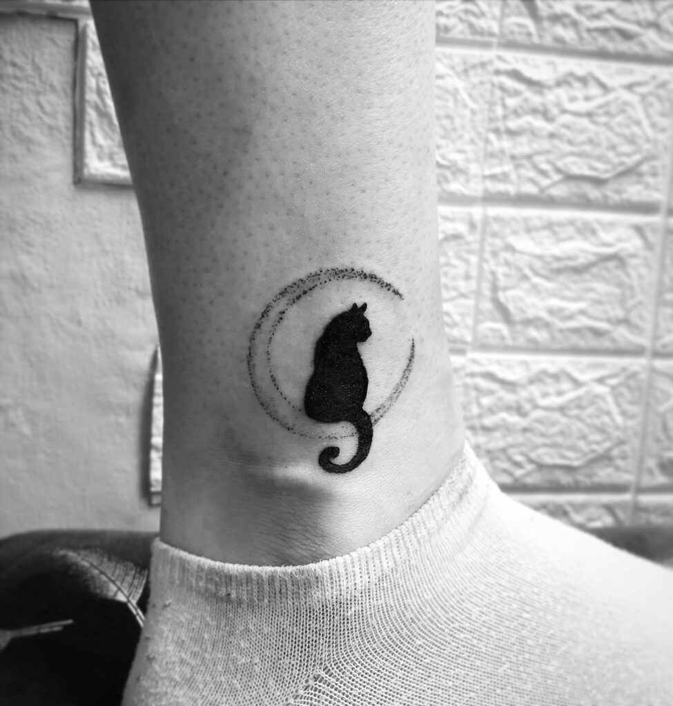 Minimal Crescent Moon Cat Tattoo small cat tattoos tattoo