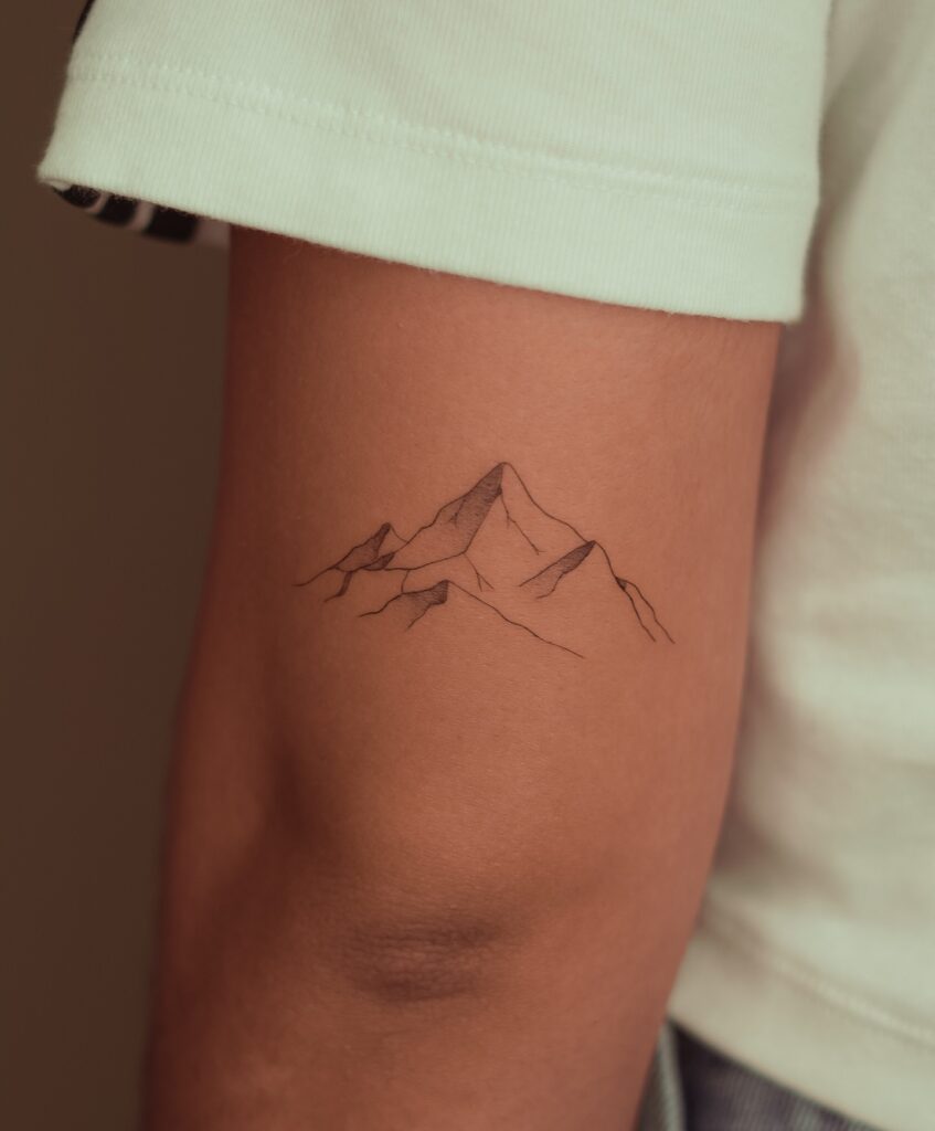 Minimal Fine Line Mountain Tattoo on Arm fine line tattoos for women tattoo