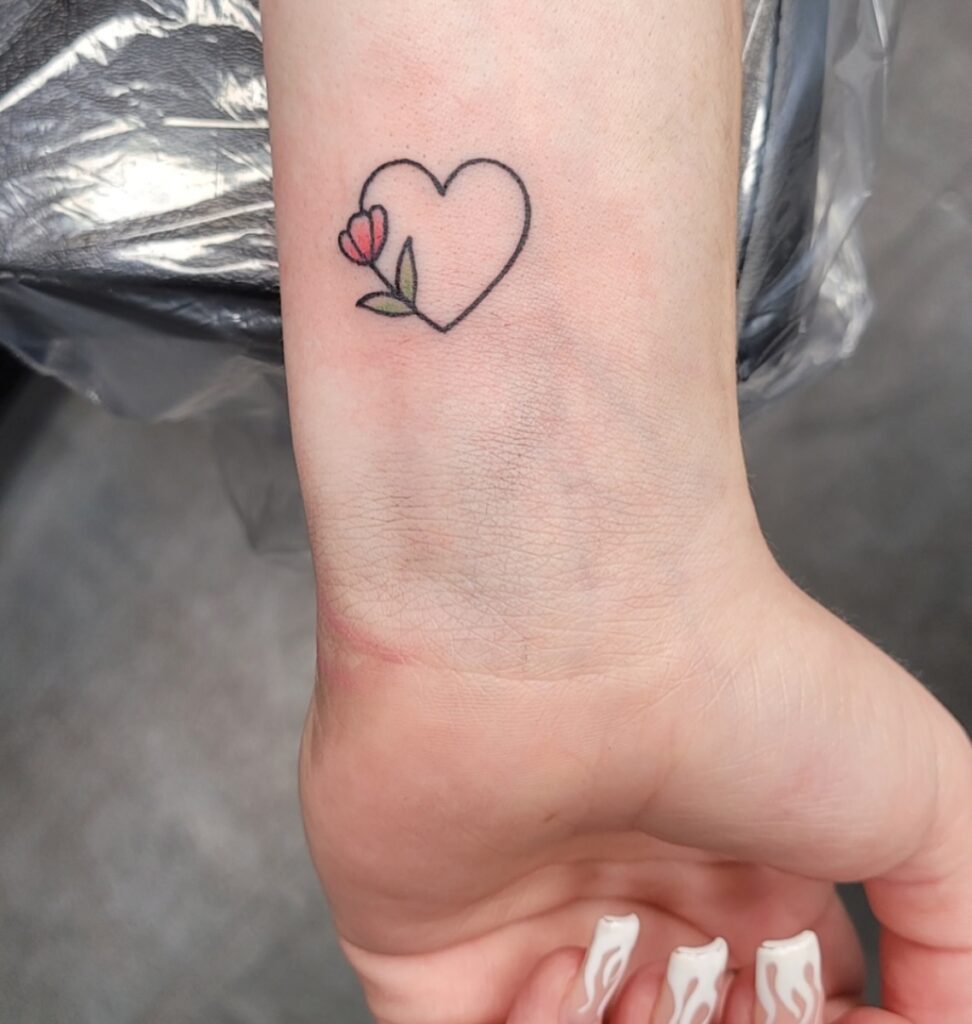 Minimal Heart and Tulip Wrist Tattoo flower wrist tattoo ideas tattoo