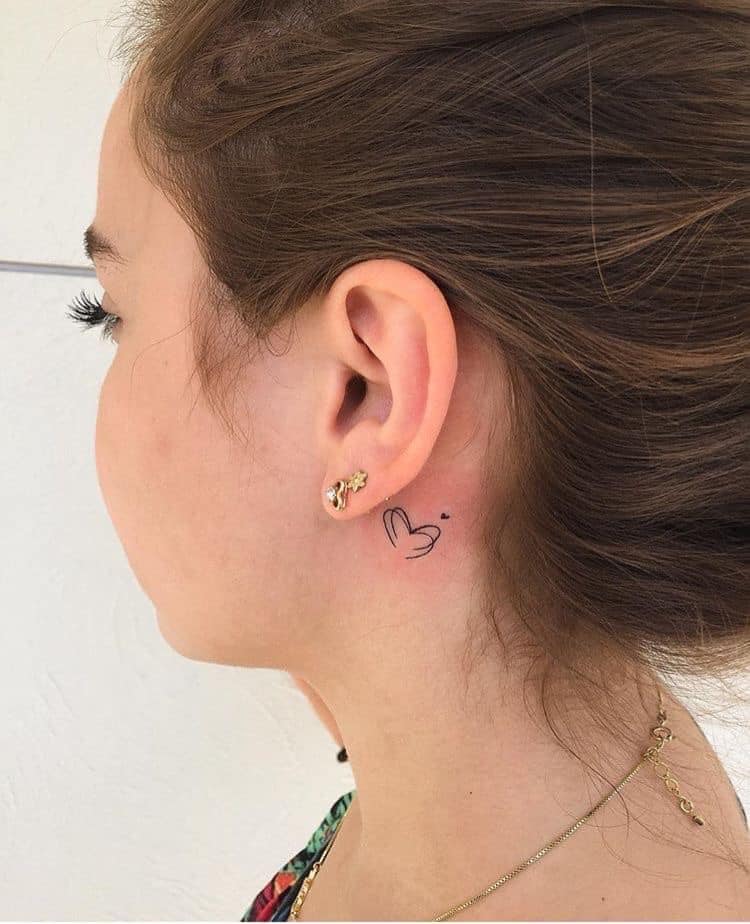 Feminine Venus Symbol Behind Ear Tattoo
