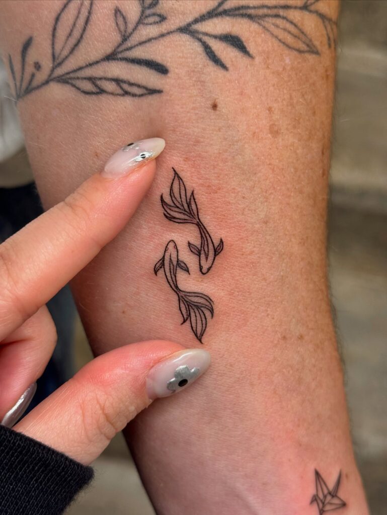 Minimal Koi Fish Pair Tattoo meaningful tiny tattoos tattoo