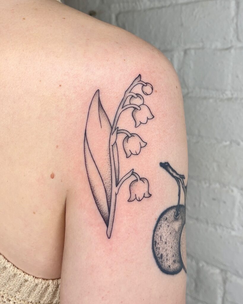 Minimal Lily of the Valley Shoulder Tattoo may birth flower tattoos tattoo