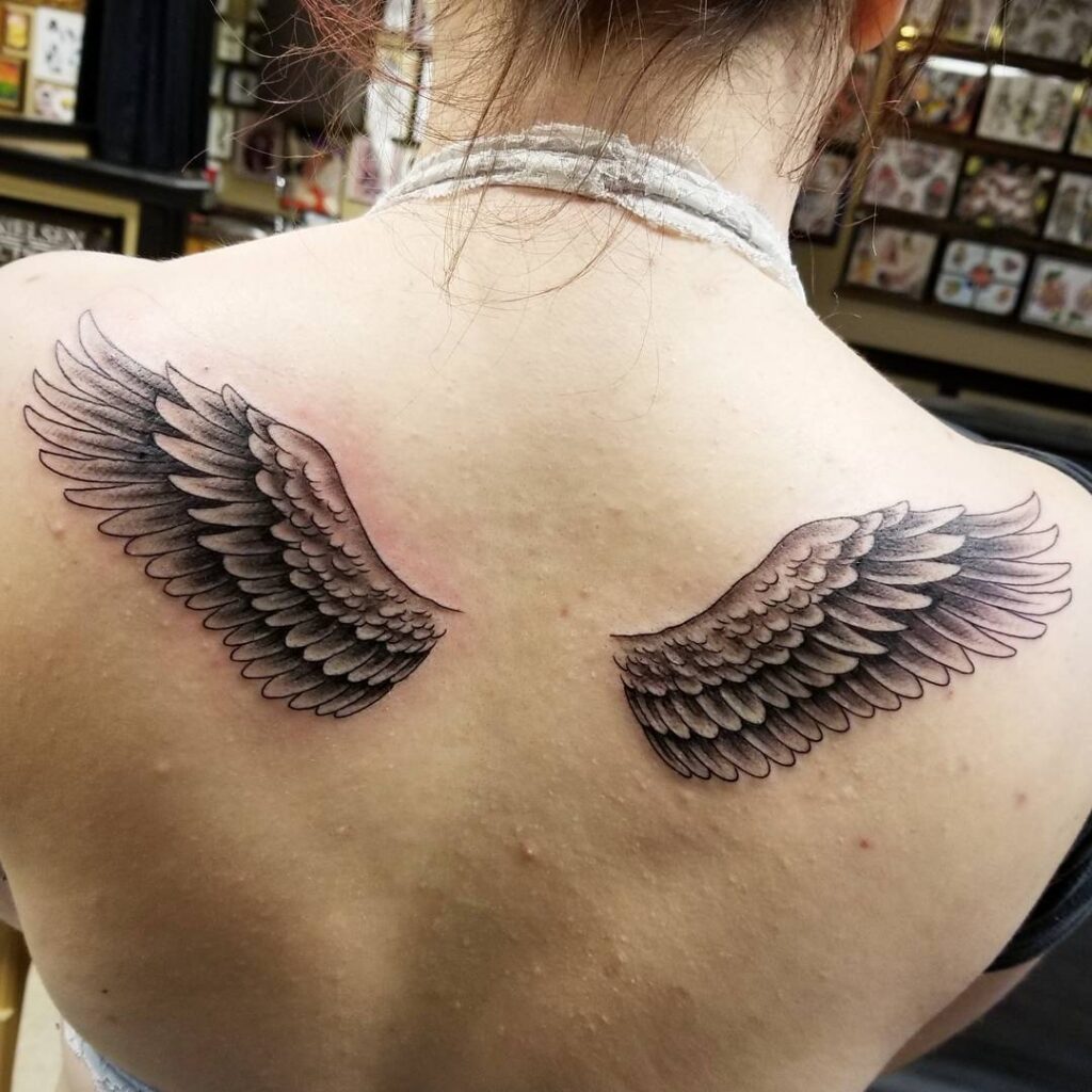 Minimal Shaded Shoulder Blade Angel Wings Tattoo angel wings tattoo ideas on back tattoo