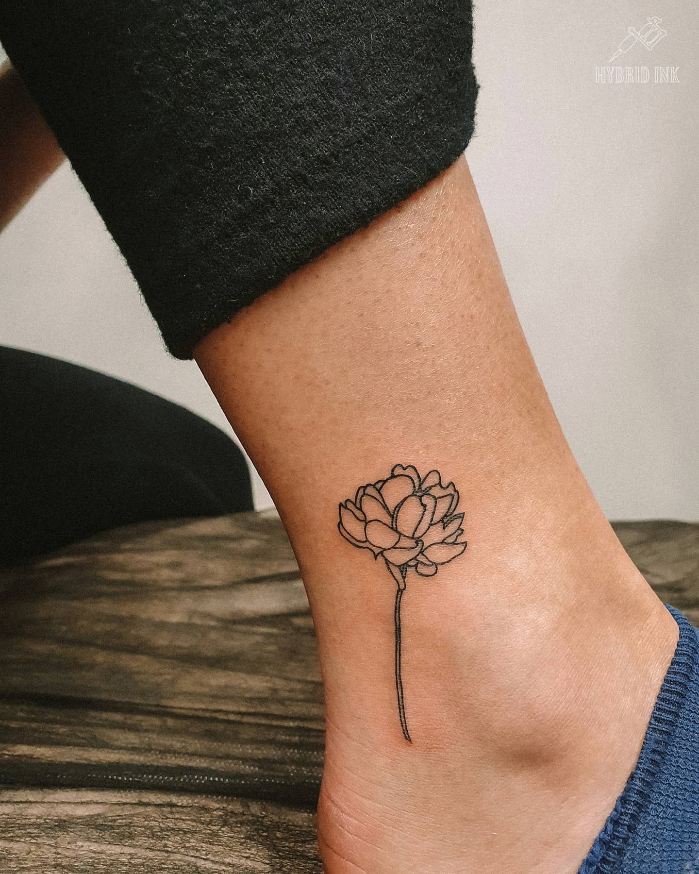 Minimal Single Peony Stem Tattoo peony tattoos ideas tattoo
