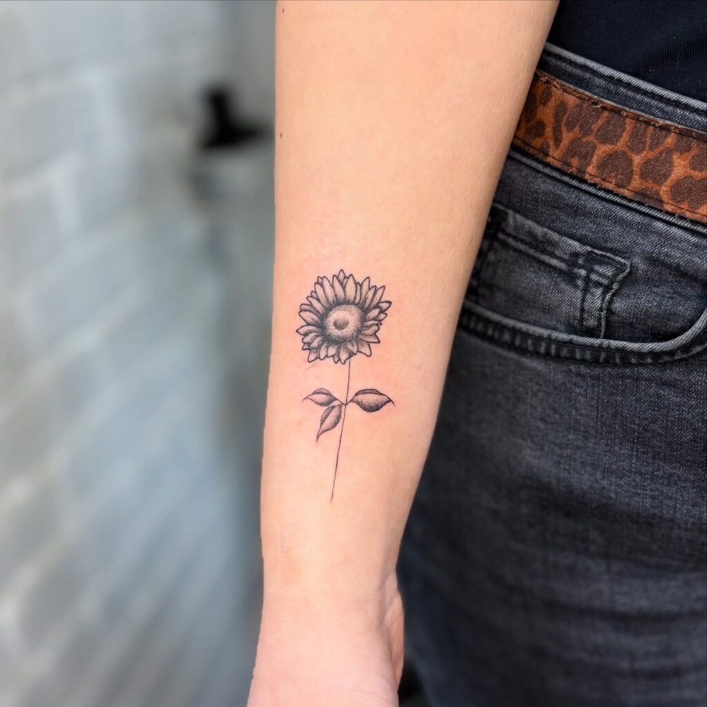 Minimal Sunflower Wrist Tattoo flower wrist tattoo ideas tattoo