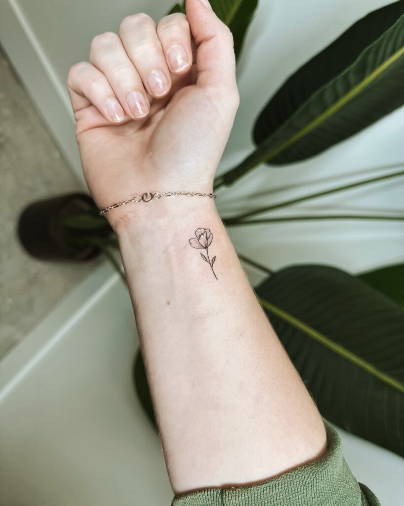 Minimalist Floral Wrist Tattoo