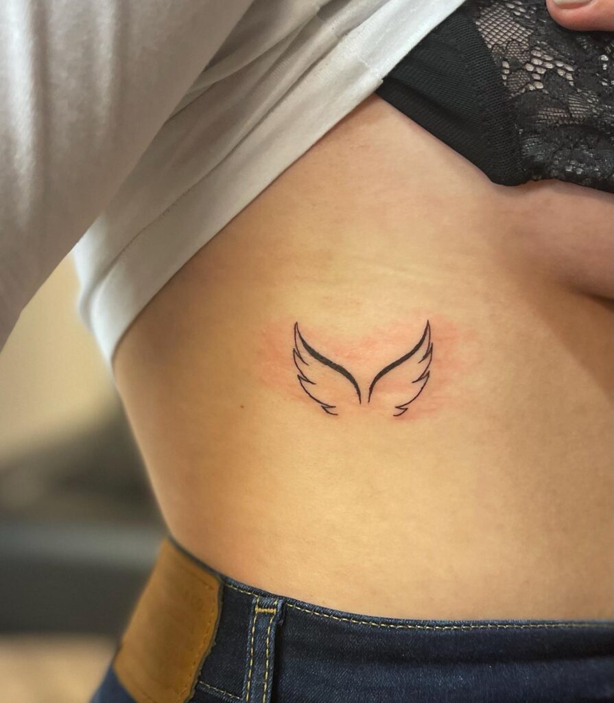 Minimalist Angel Wings Tattoo angel wings tattoo ideas tattoo