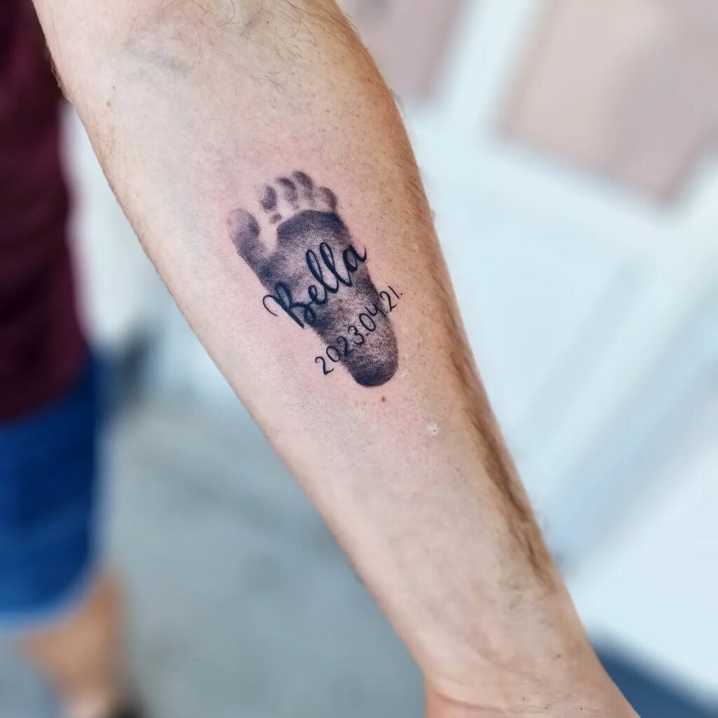 Minimalist Baby Footprint Tattoo baby feet tattoos tattoo