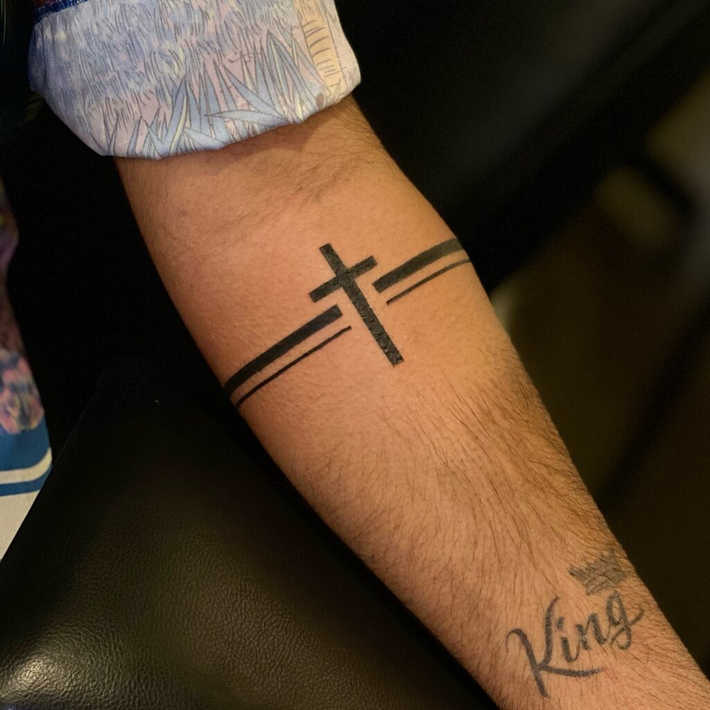 Minimalist Cross with Armband Design cross tattoos for men tattoo