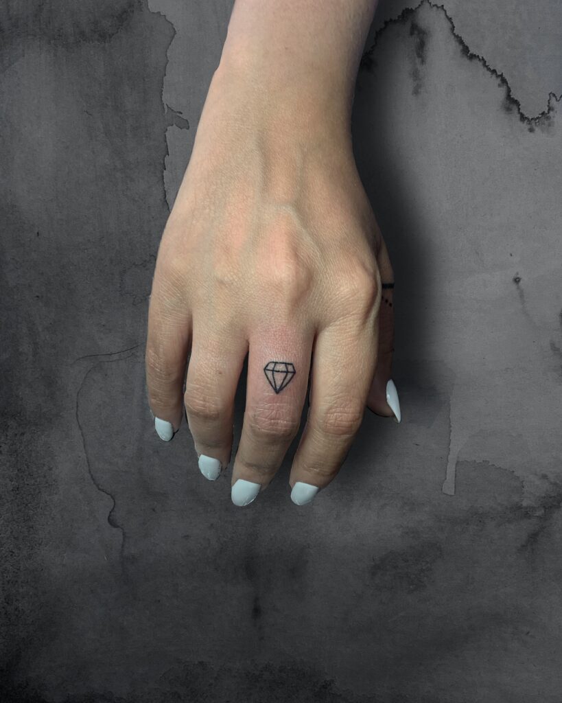 Snowflake Finger Tattoo