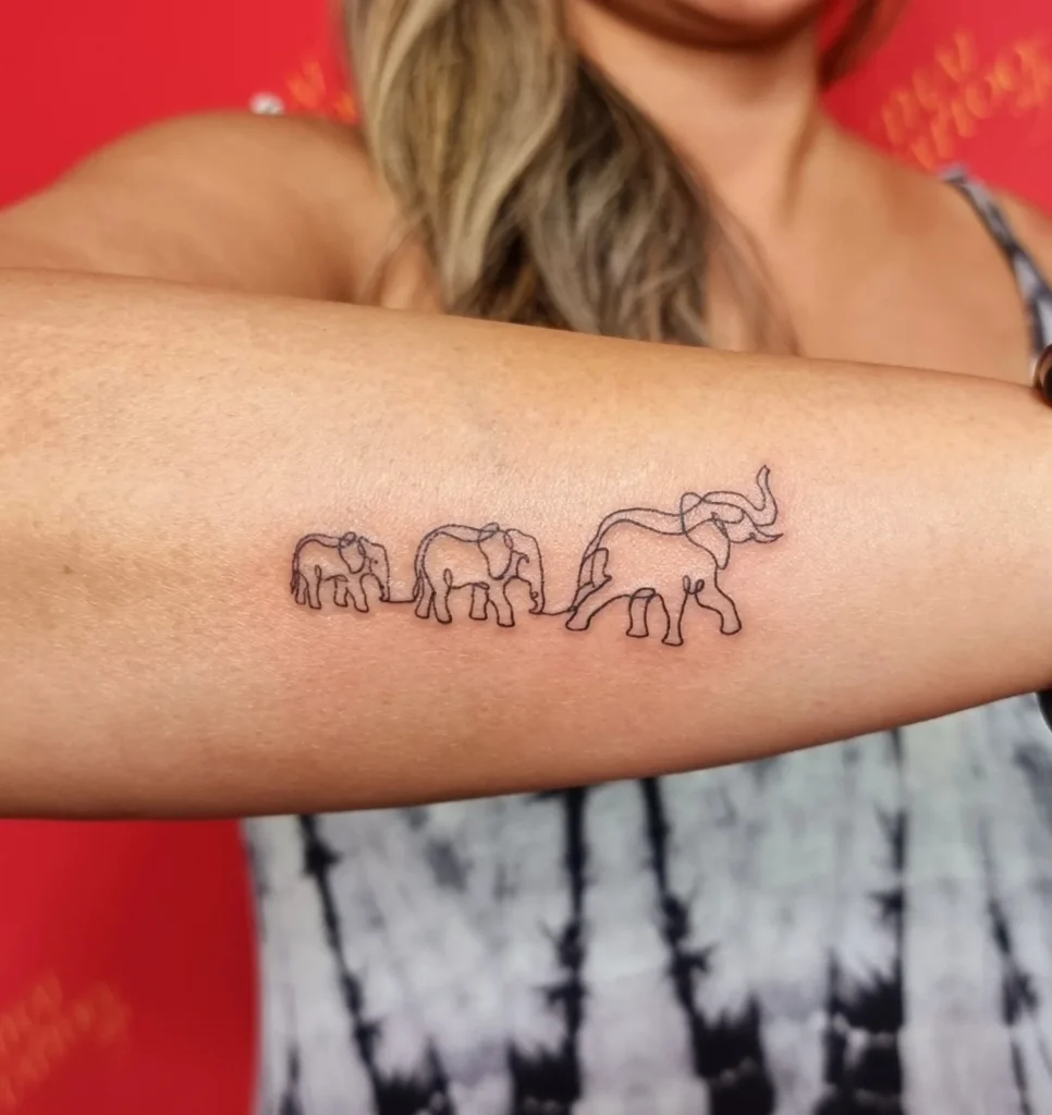 Minimalist Elephant Family Line Tattoo elephant family tattoo ideas tattoo