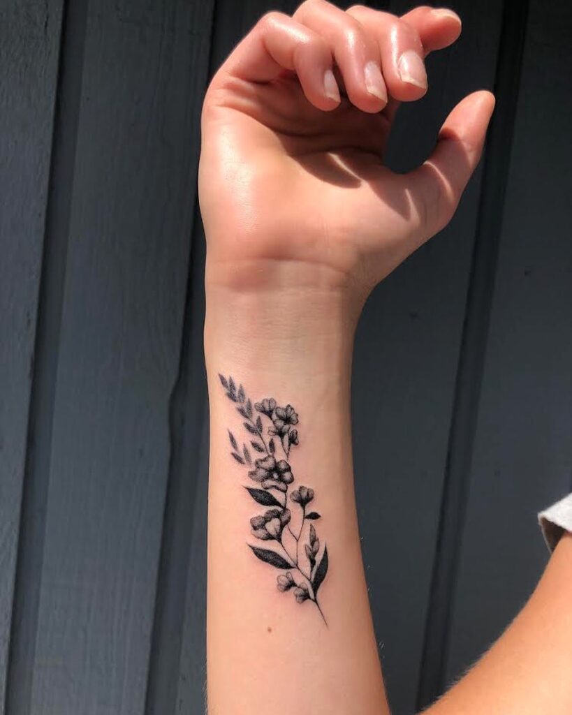 Vibrant Orange Rose Wrist Tattoo