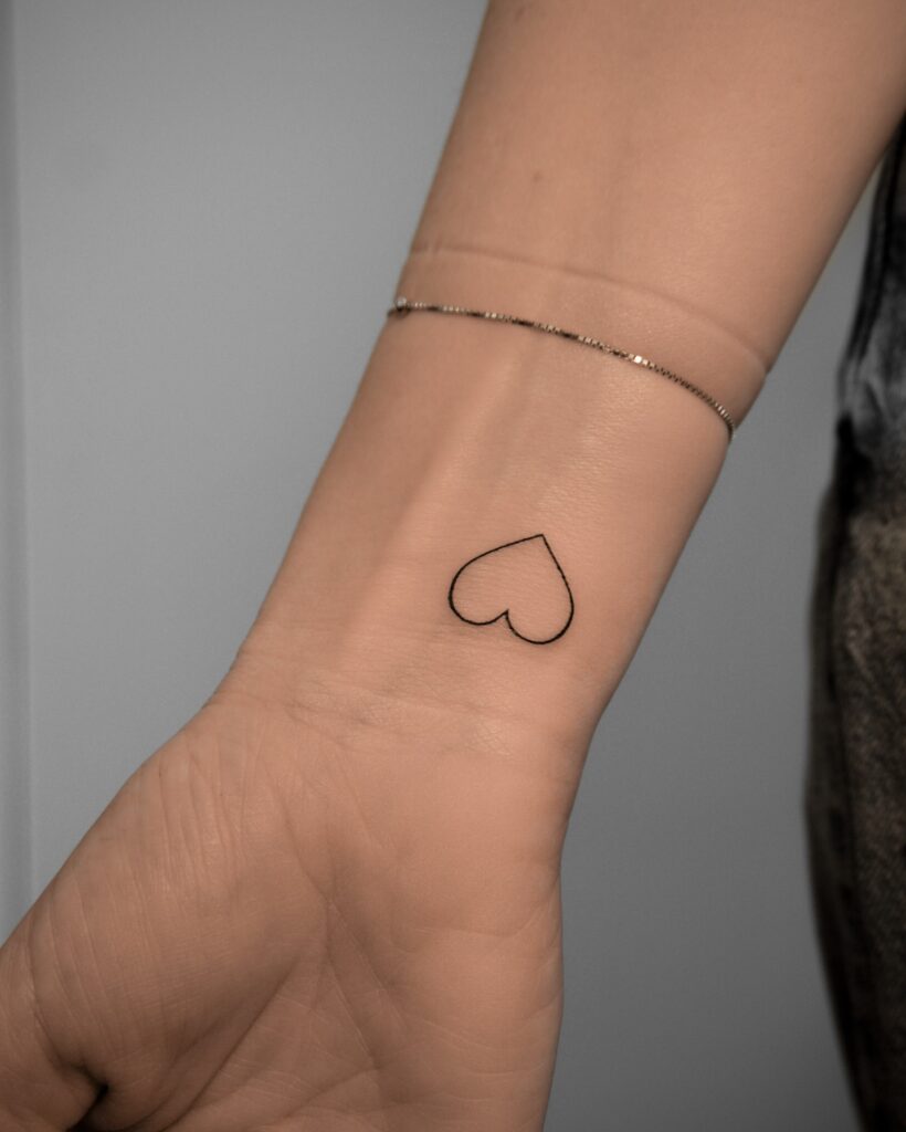 Minimalist Heart Outline Tattoo
