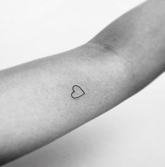 Heart with Floral Accent and Dotted Details small heart tattoo ideas tattoo