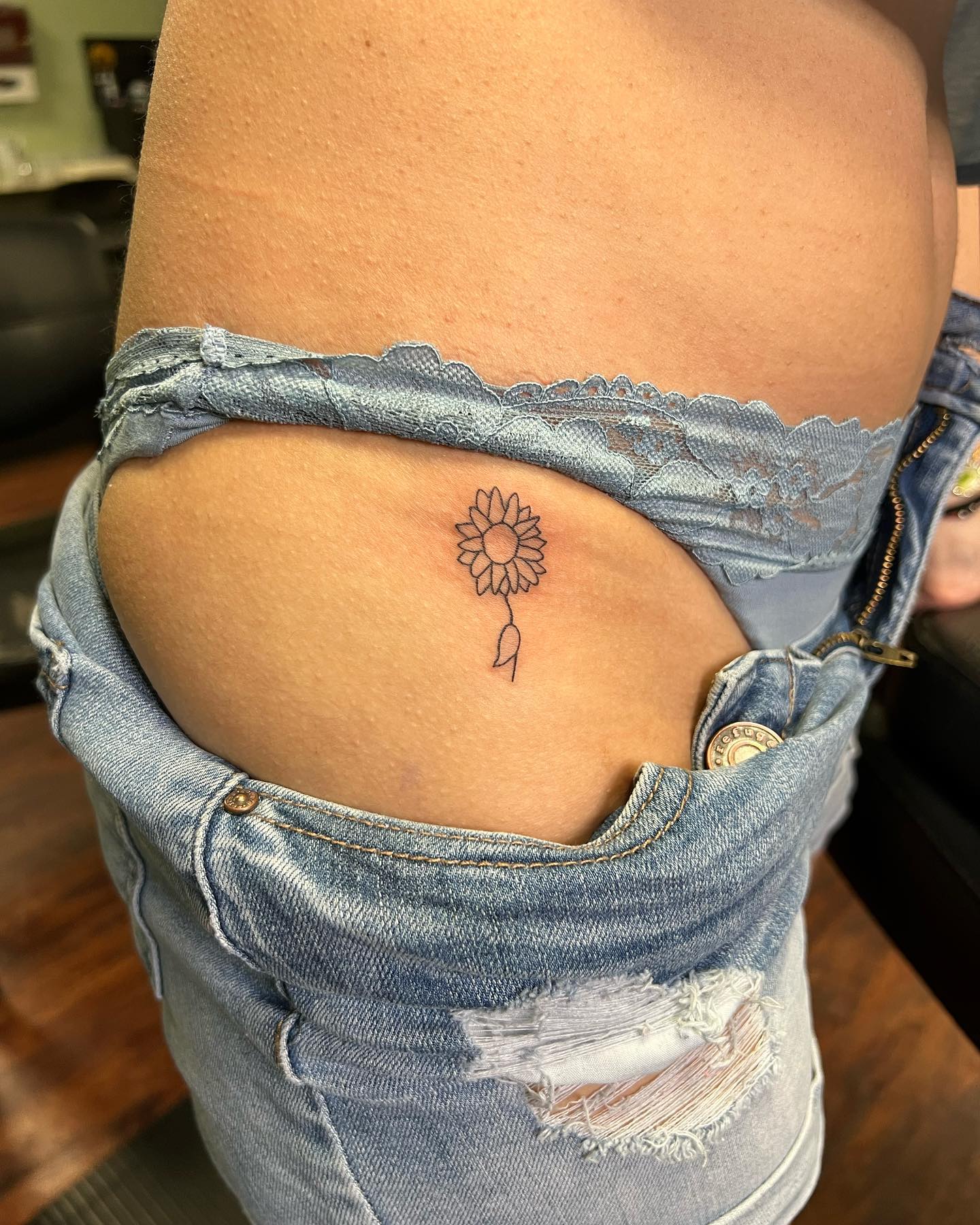 Minimalist Hip Sunflower Tattoo small sunflower tattoos ideas tattoo