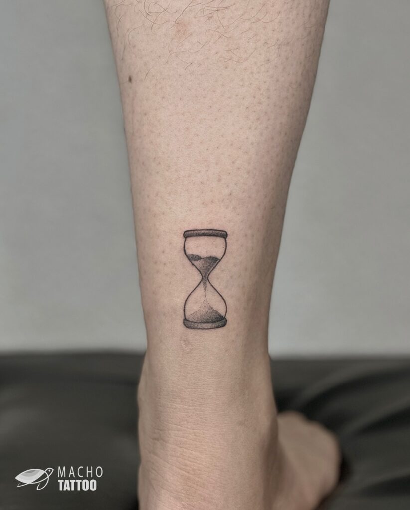 Minimalist Hourglass Ankle Tattoo hourglass tattoo ideas tattoo