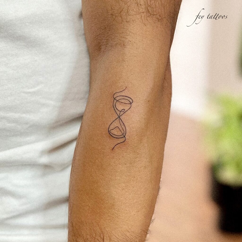Minimalist Hourglass Outline Tattoo hourglass tattoo ideas tattoo