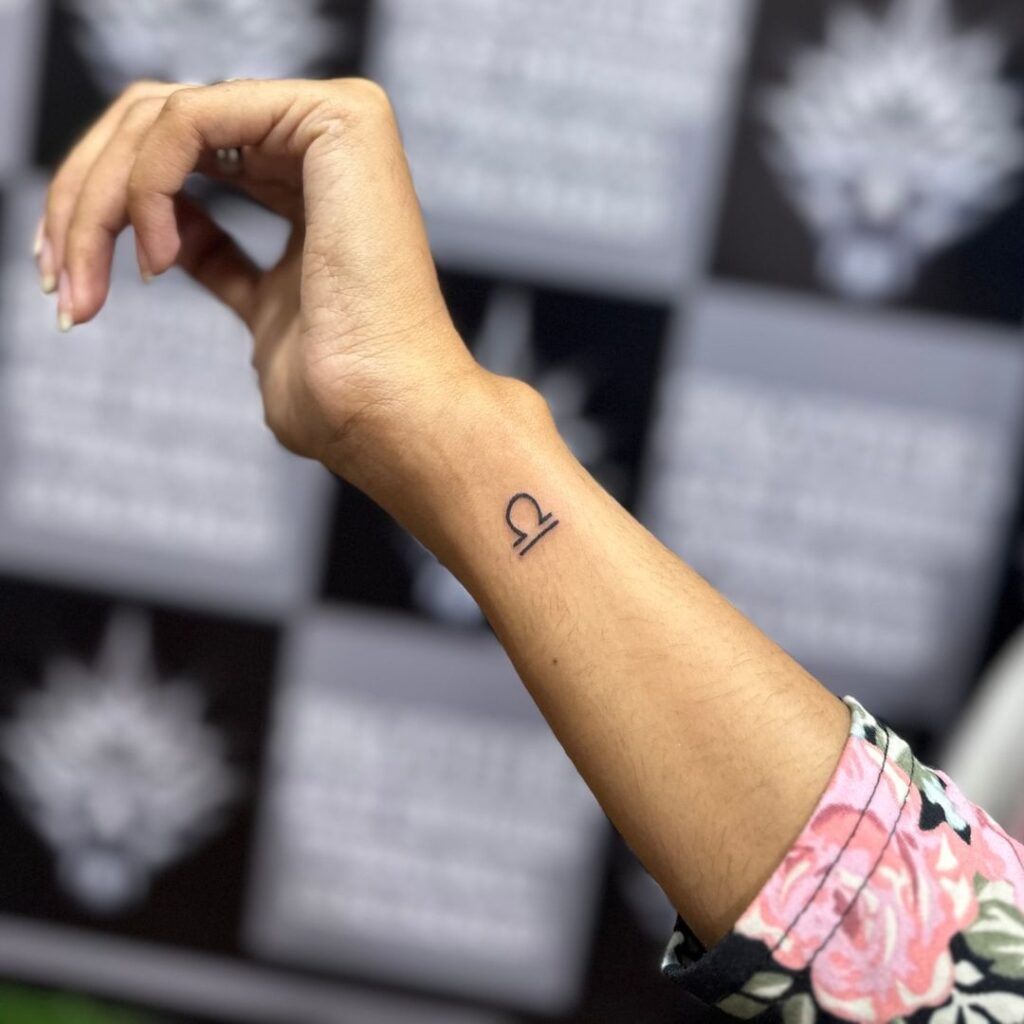 Minimalist Libra Symbol meaningful tattoos to check out tattoo