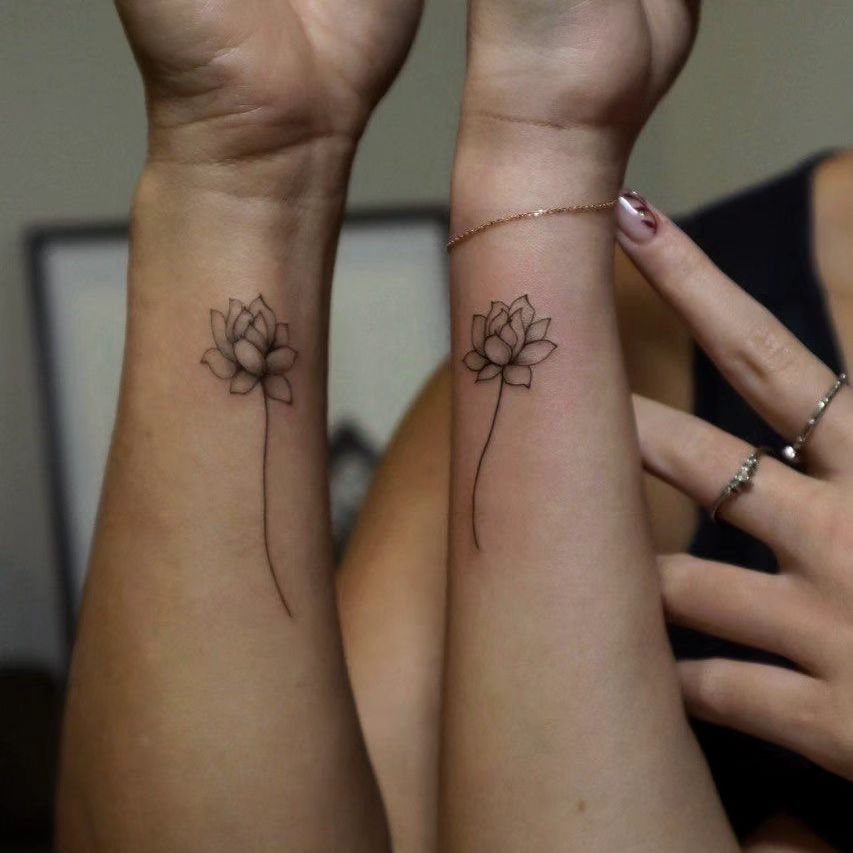 Minimalist Lotus Mother-Daughter Tattoo mother and daughter tattoo ideas tattoo