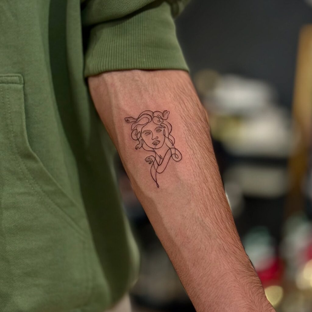 Minimalist Medusa Line Art Tattoo
