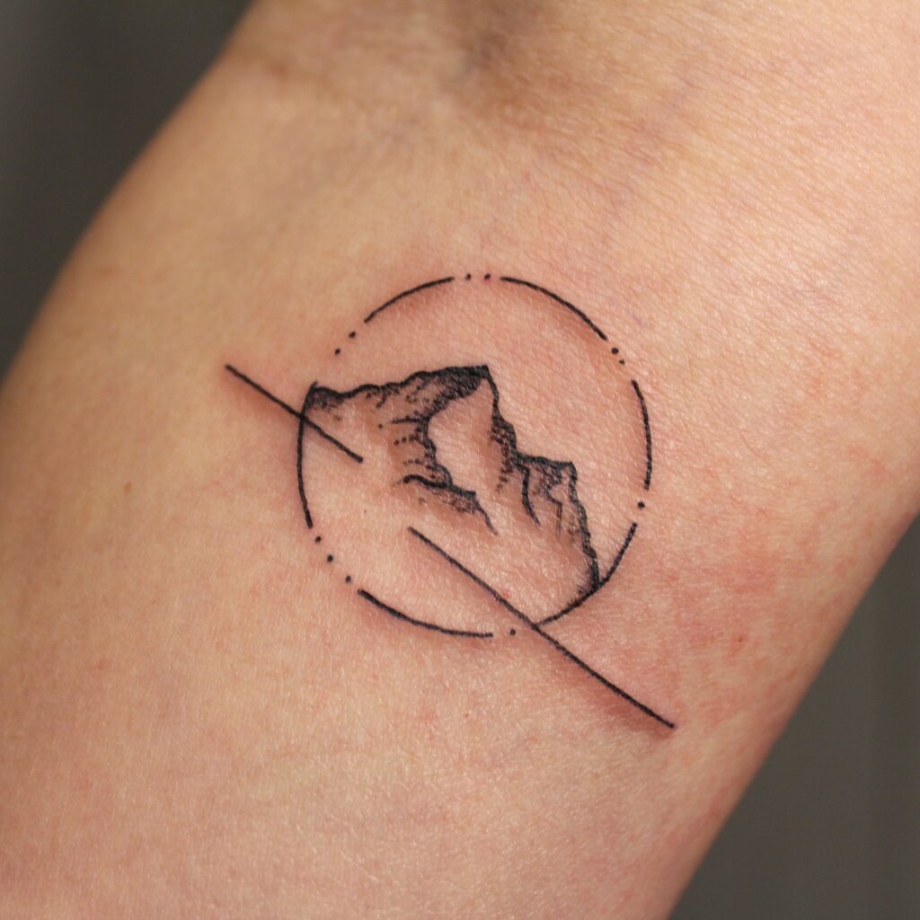 Minimalist Mountain Circle Tattoo mountain tattoos tattoo