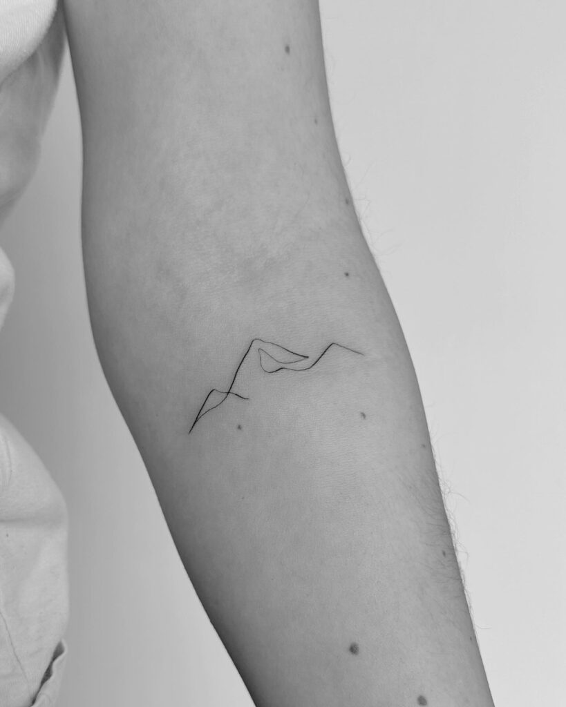 Minimalist Mountain Line Tattoo mountain tattoos tattoo