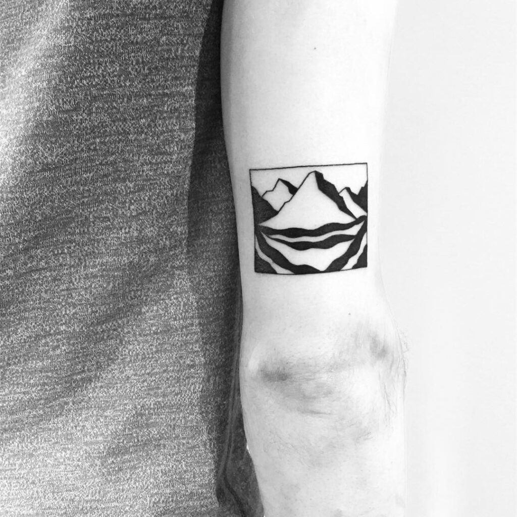 Minimalist Mountain Mirror Reflection tattoo