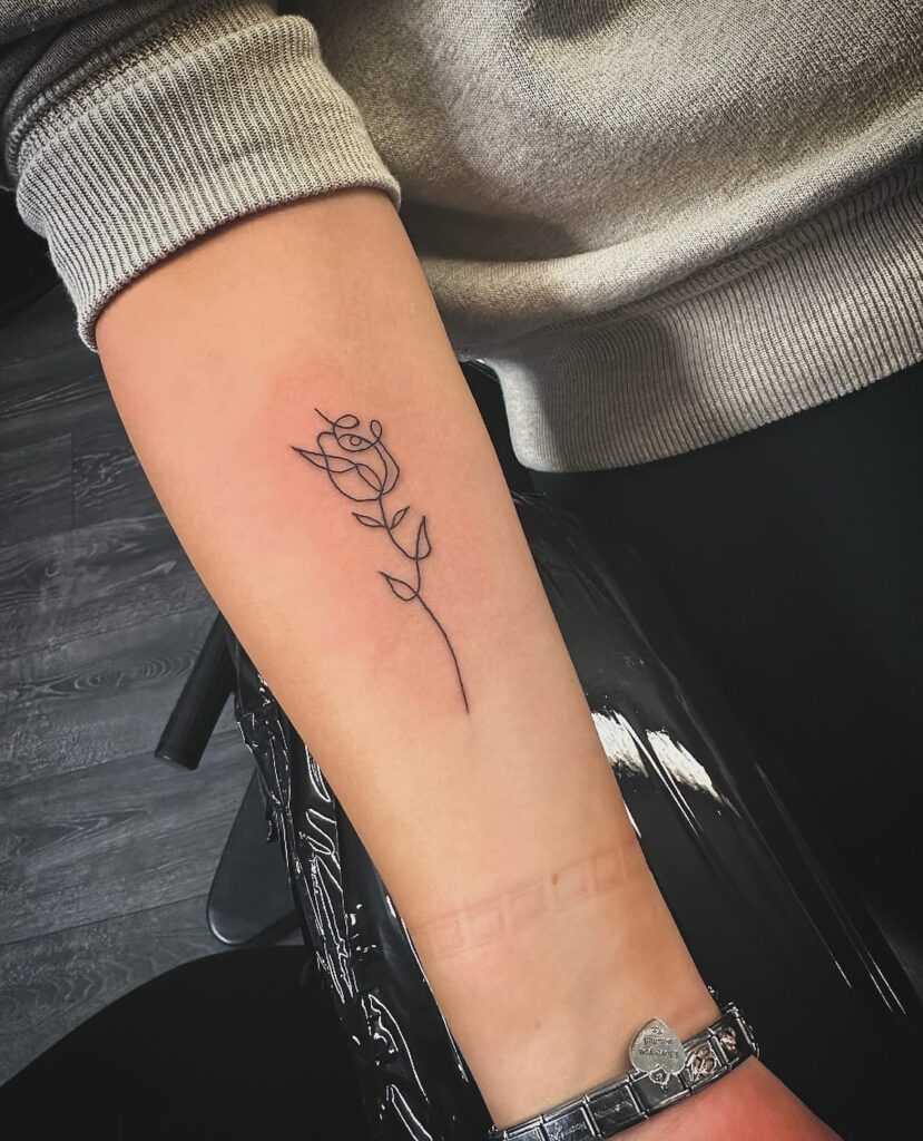 Minimalist One-Line Rose Tattoo on Forearm rose tattoos for women tattoo