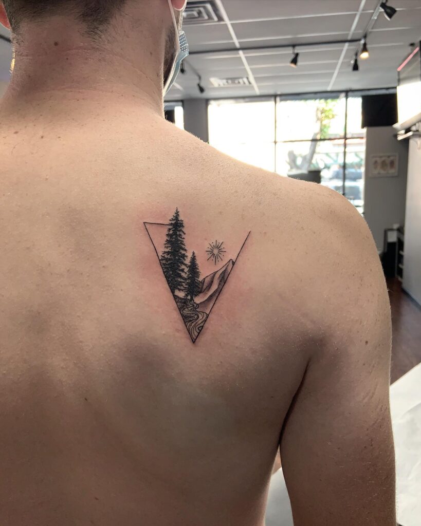 Minimalist Panoramic Mountain Spine Piece nature scene tattoo