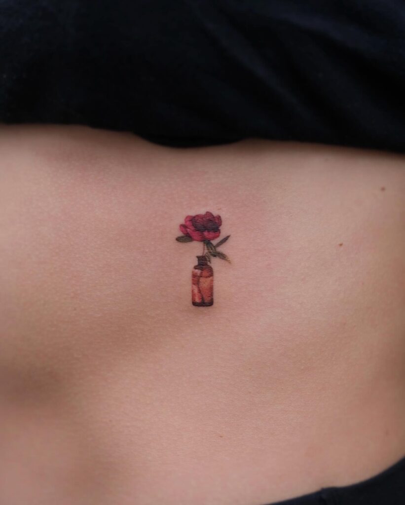 Minimalist Peony in a Bottle Tattoo peony flower tattoo ideas tattoo