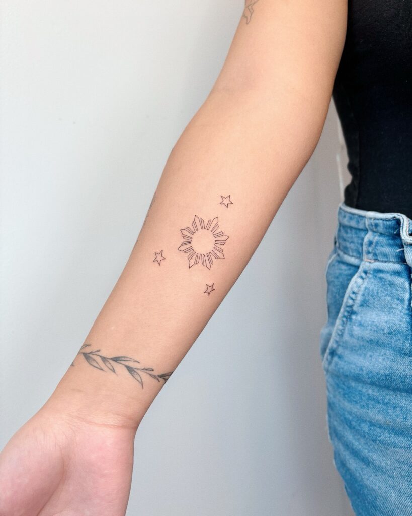 Minimalist Philippine Sun and Stars Tattoo