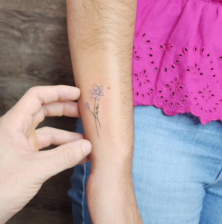 Minimalist Purple Narcissus Tattoo december birth flower tattoo ideas tattoo