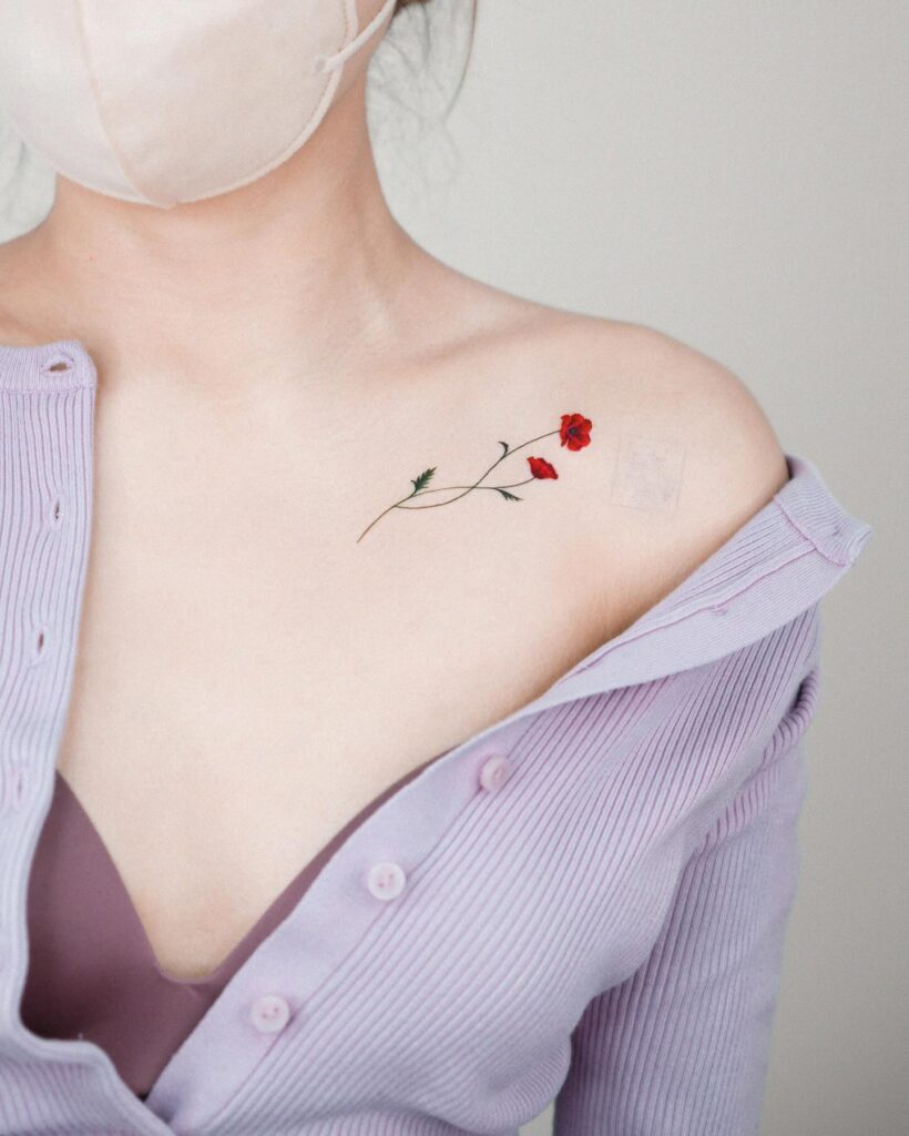 Empowering Dutch Quote Collarbone Tattoo
