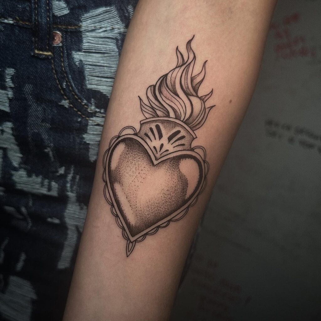 Traditional Sacred Heart Tattoo with Rose and Flames sacred heart tattoo ideas tattoo