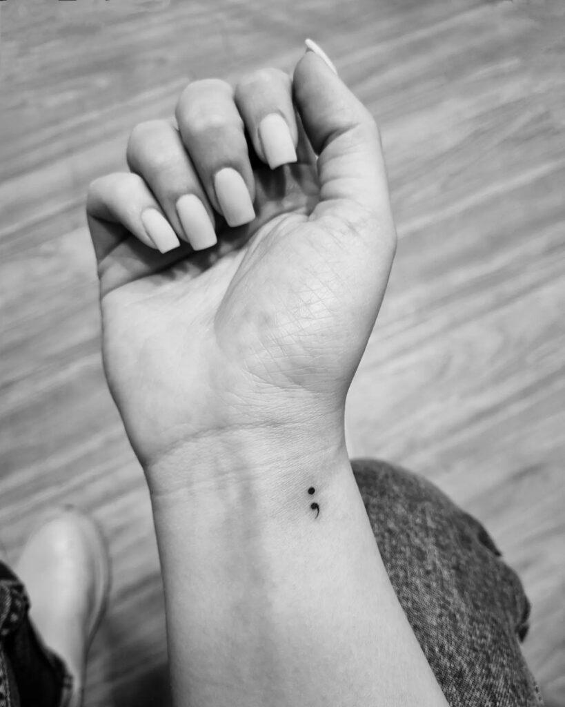 Minimalist Semi-Colon Wrist Tattoo meaningful semicolon tattoo ideas tattoo