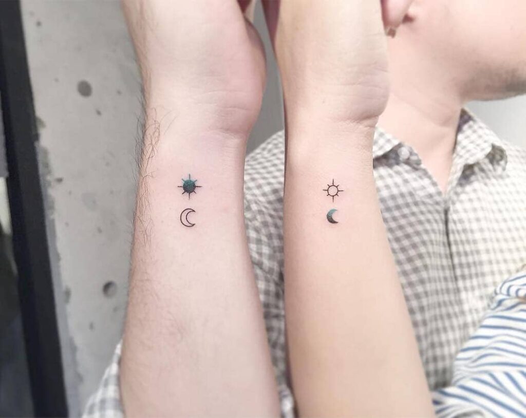 Minimalist Sun and Moon Couple Tattoos symbolic sun and moon tattoo ideas tattoo