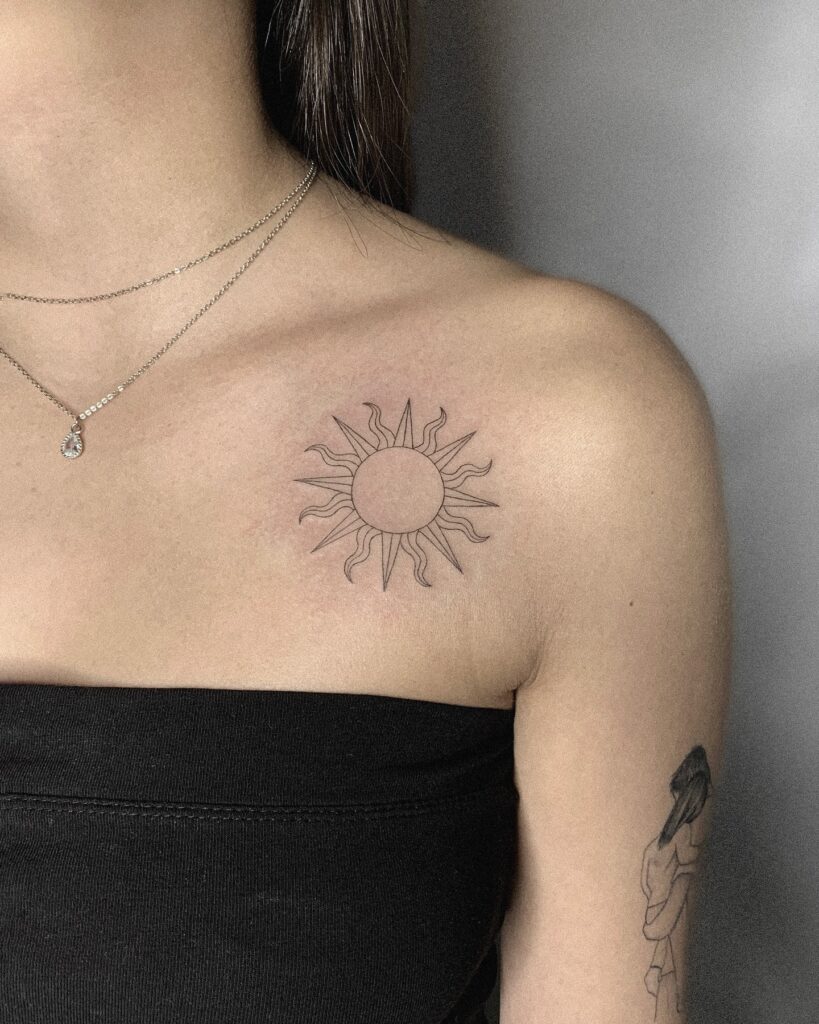 Minimalist Sun Tattoo on Chest sun tattoos tattoo