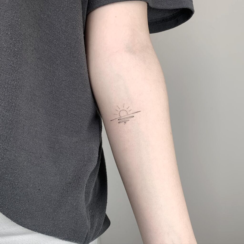 Minimalist Sunset and Wave Tattoo sun tattoos tattoo