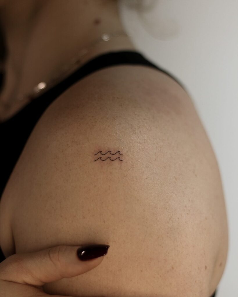 Minimalist Wave Shoulder Tattoo