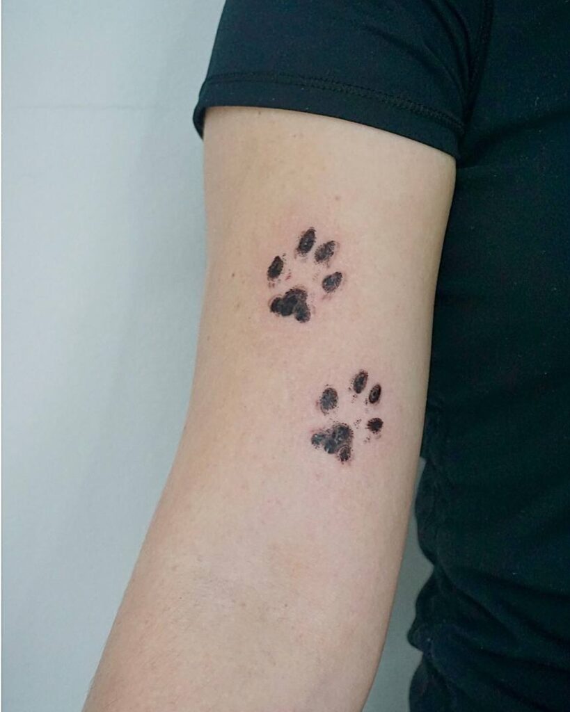 Minimalistic Dual Paw Prints Tattoo paw print tattoo ideas tattoo